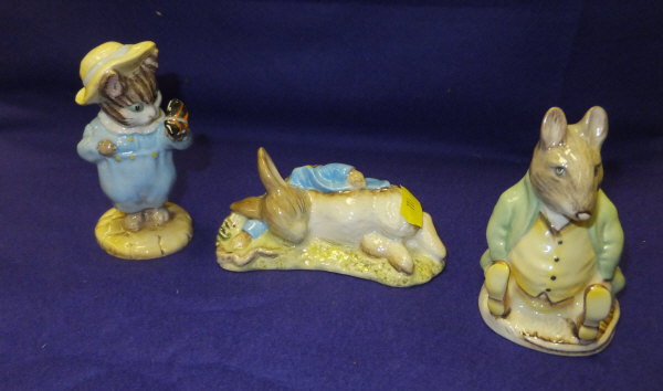 Three Royal Albert Beatrix Potter figures comprising "Peter in the gooseberry net", "Samuel