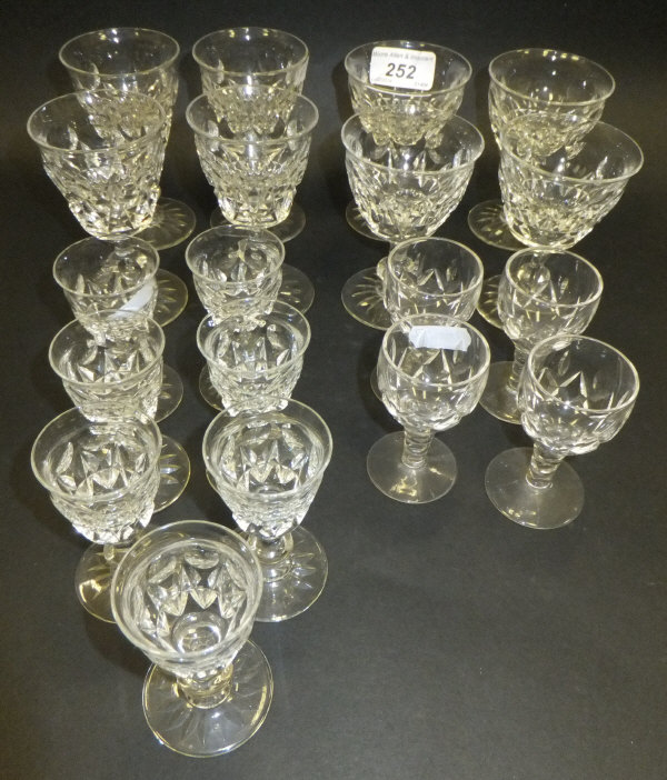 A collection of cut glass wine and liqueur glasses comprising Stuart and Tudor