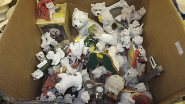 A box containing various Highland Terrier models