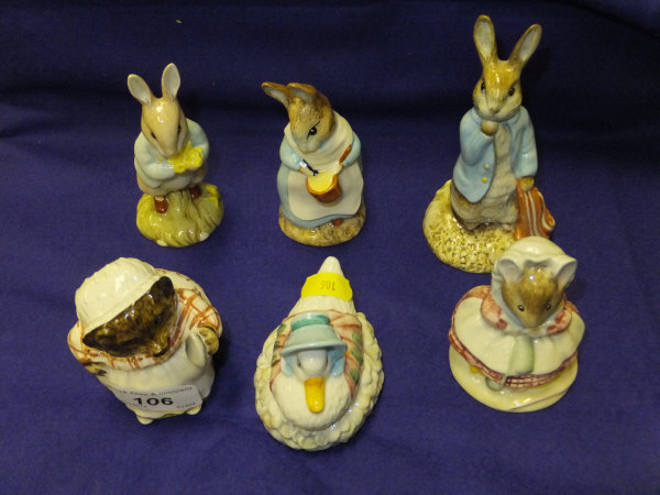 Six Royal Albert Beatrix Potter figures comprising "Mrs. Tiggwinkle", "The Old Woman who lived in