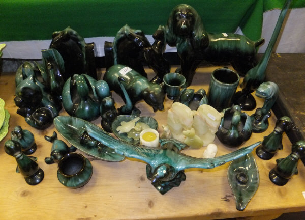 A large collection of pottery ornaments with mottled green glaze (possibly Canadian) to include