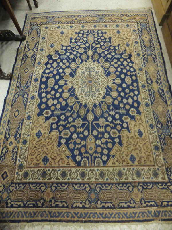 A Caucasian rug, 200 cm x 138 cm