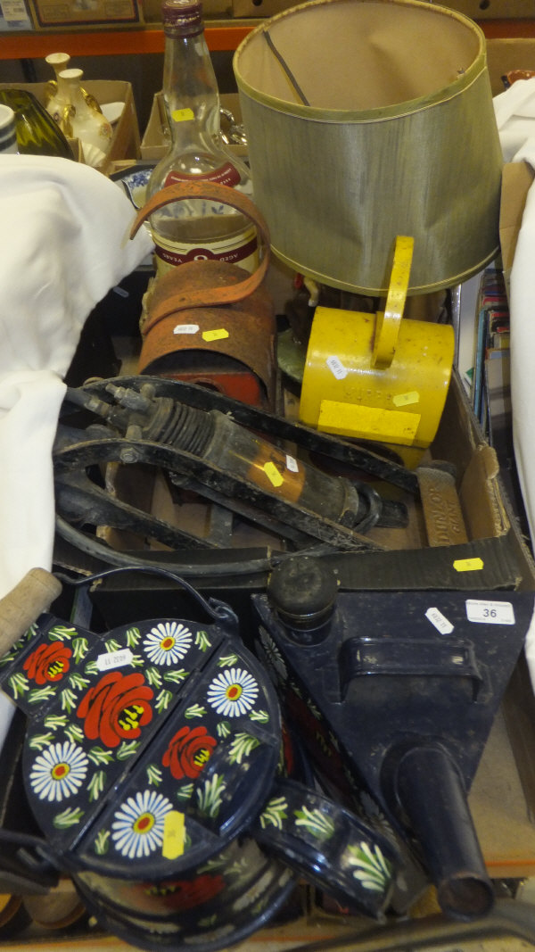 A box containing two roadwork lanterns, a Bell's Whisky bottle, table lamp, Dunlop Giant pump and