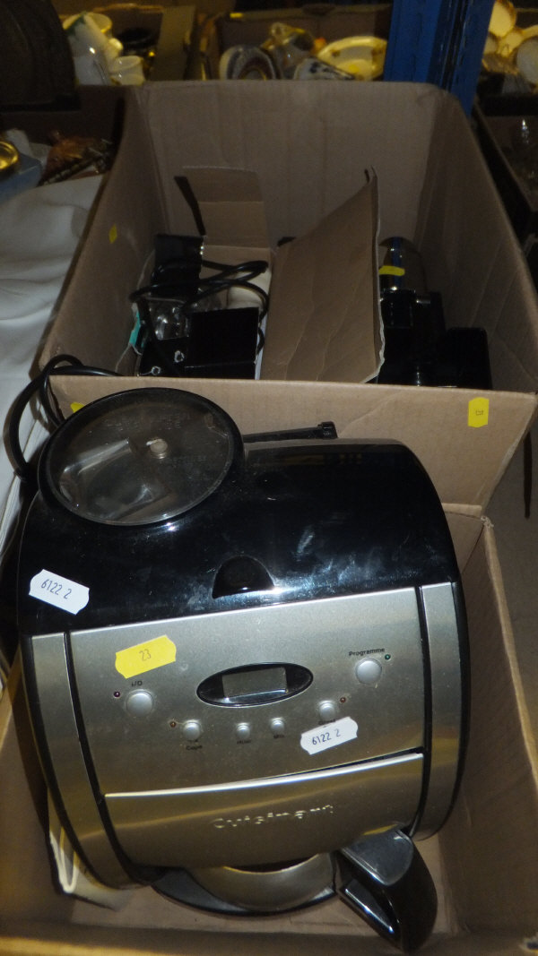 A Cuisinart coffee maker, together with a DeLonghi Nespresso coffee maker and a Dualit hand mixer