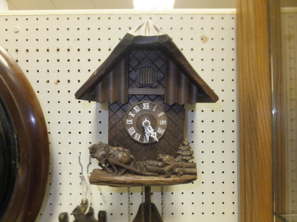 A cuckoo clock of typical form