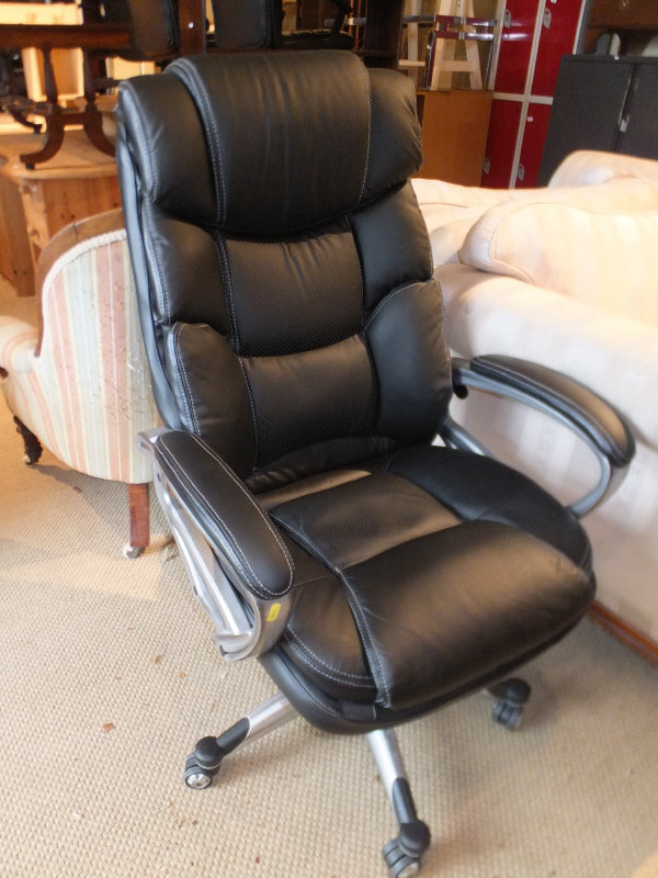 A modern office swivel arm chair