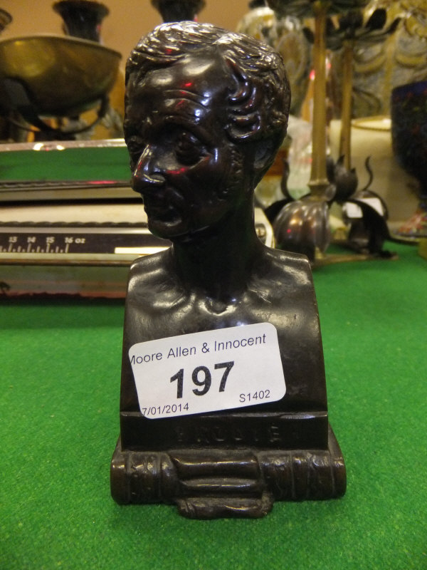 A bronze bust of Brodie