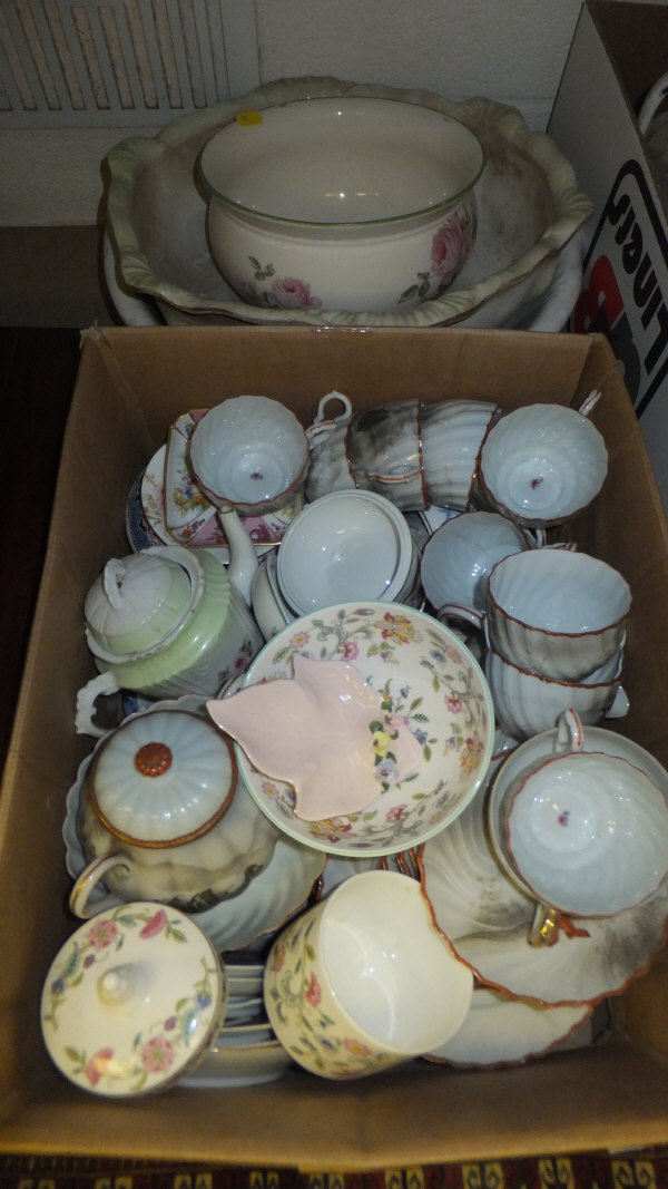 A box of assorted china wares to include eggshell tea wares, etc, two wash bowls and a chamber pot