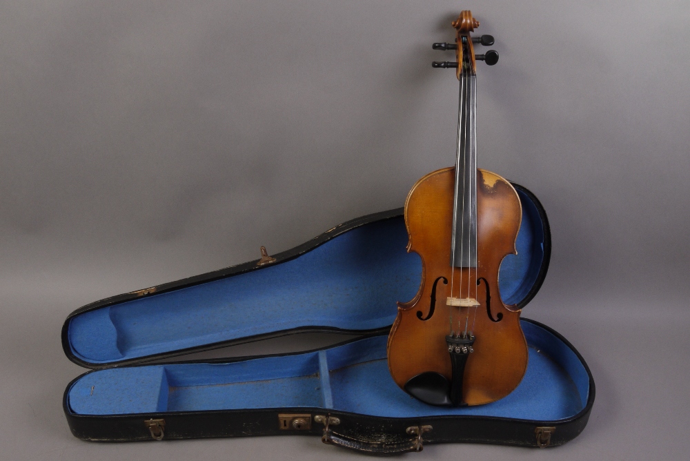 A German violin labelled Nicolans Amatus, 19th century, the one piece back with medium slanted curl, - Image 2 of 2