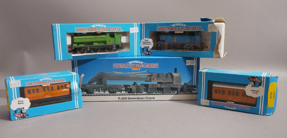 A collection of Hornby OO gauge Thomas the Tank Engine;  including Thomas, Duck, Annie, Clarabel and