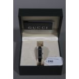 A ladies wristwatch by Gucci in stainles