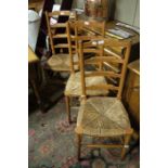 Three oak ladder back rush seated single