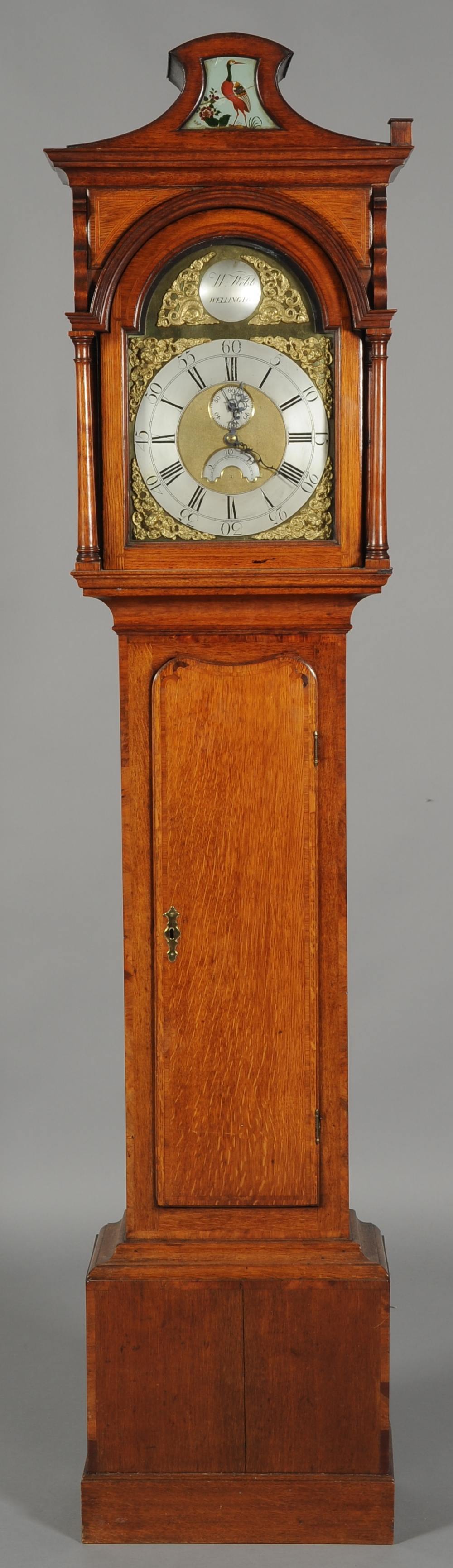 A LATE GEORGE III OAK, CROSS BANDED AND LINE-INLAID LONGCASE CLOCK, the eight day, four pillar