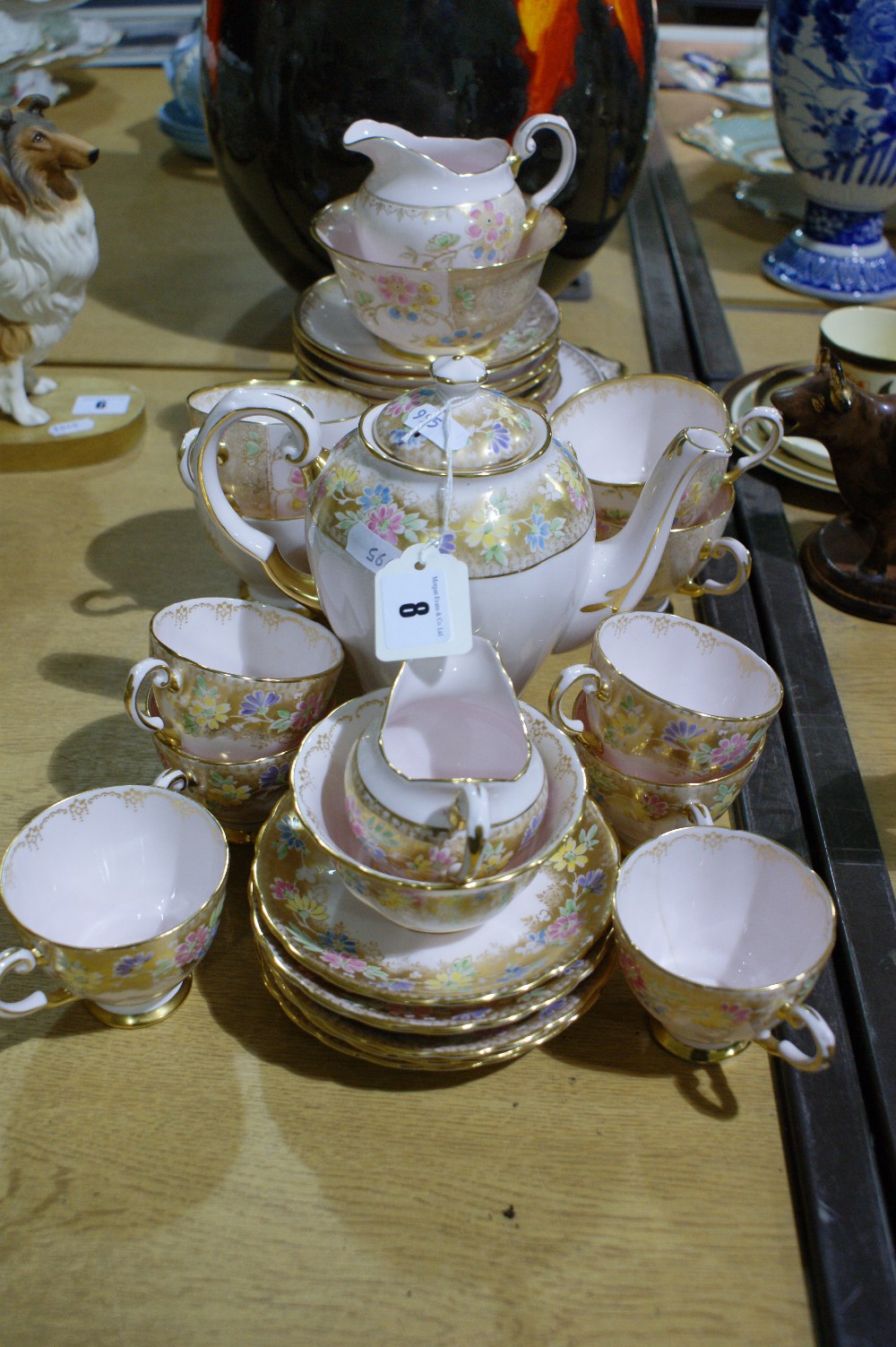 Two Tuscan China Pink Ground Gilt And Floral Decorated Part Tea Sets