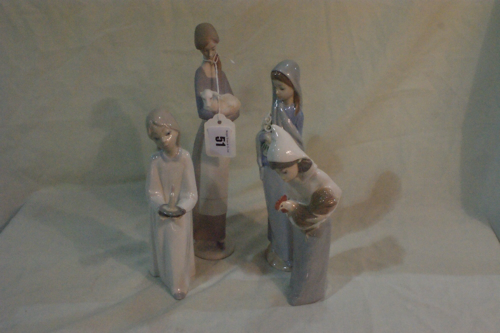 Four Lladro Porcelain Figures