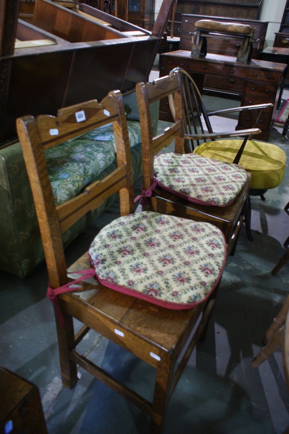 A Pair Of Antique Oak Diamond And Dot Motif Farmhouse Chairs