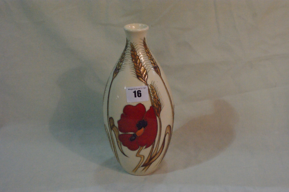 A Contemporary Moorcroft Pottery Circular Based Vase Decorated In The Harvest Poppy Design, 10""