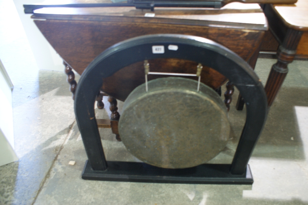 An Edwardian Period Brass Dinner Gong And Stand