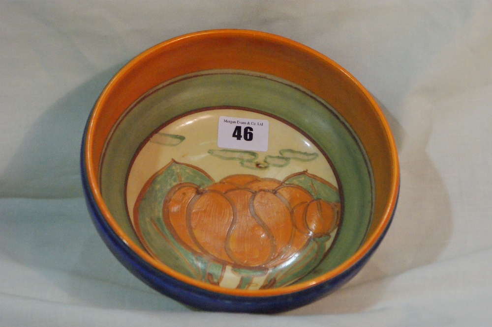 A Clarice Cliff Bizarre Ware Three Footed Circular Fruit Bowl Decorated With A Variation Of The