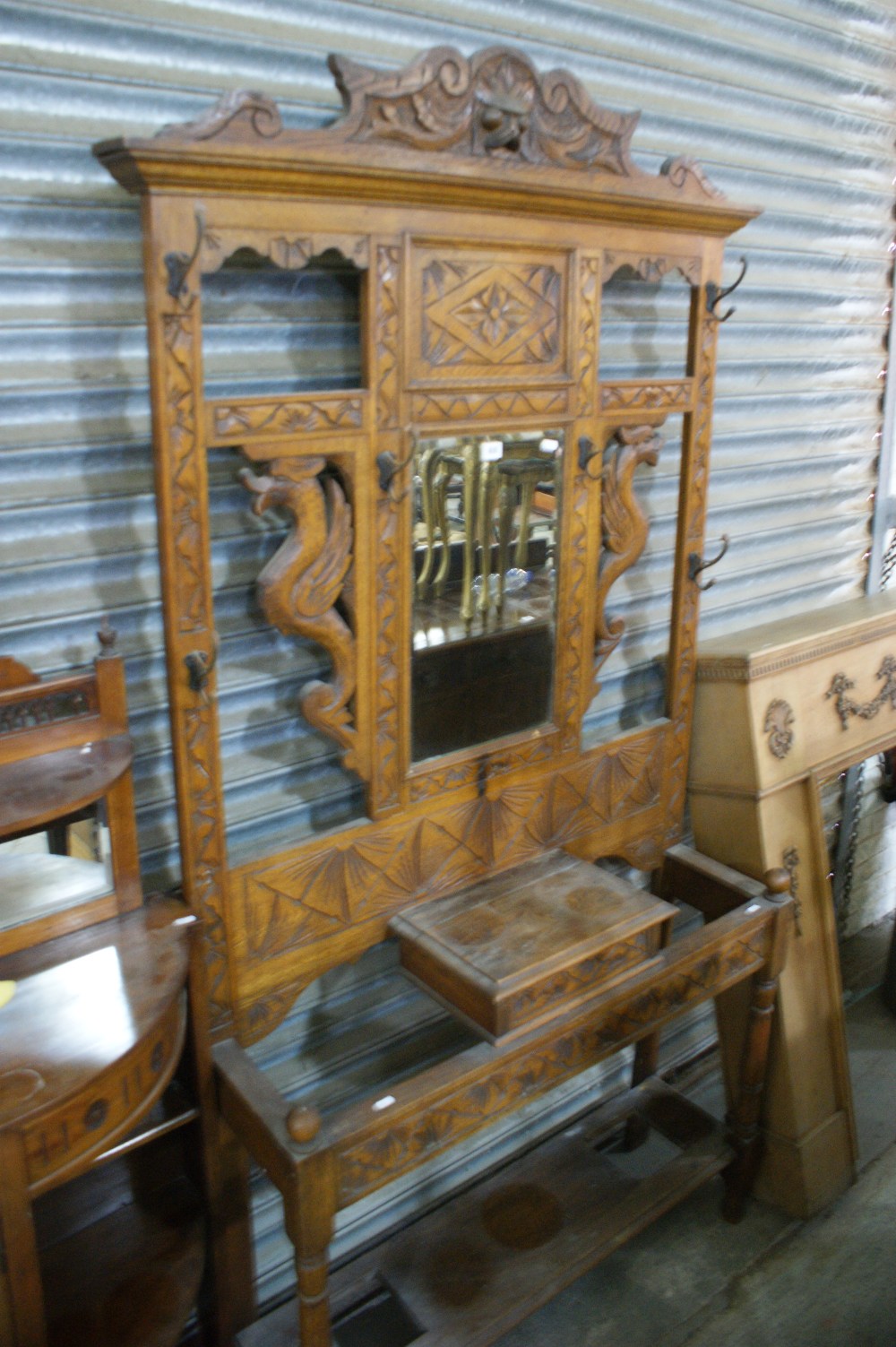 An Edwardian Carved Oak And Mirrored Hall Stand