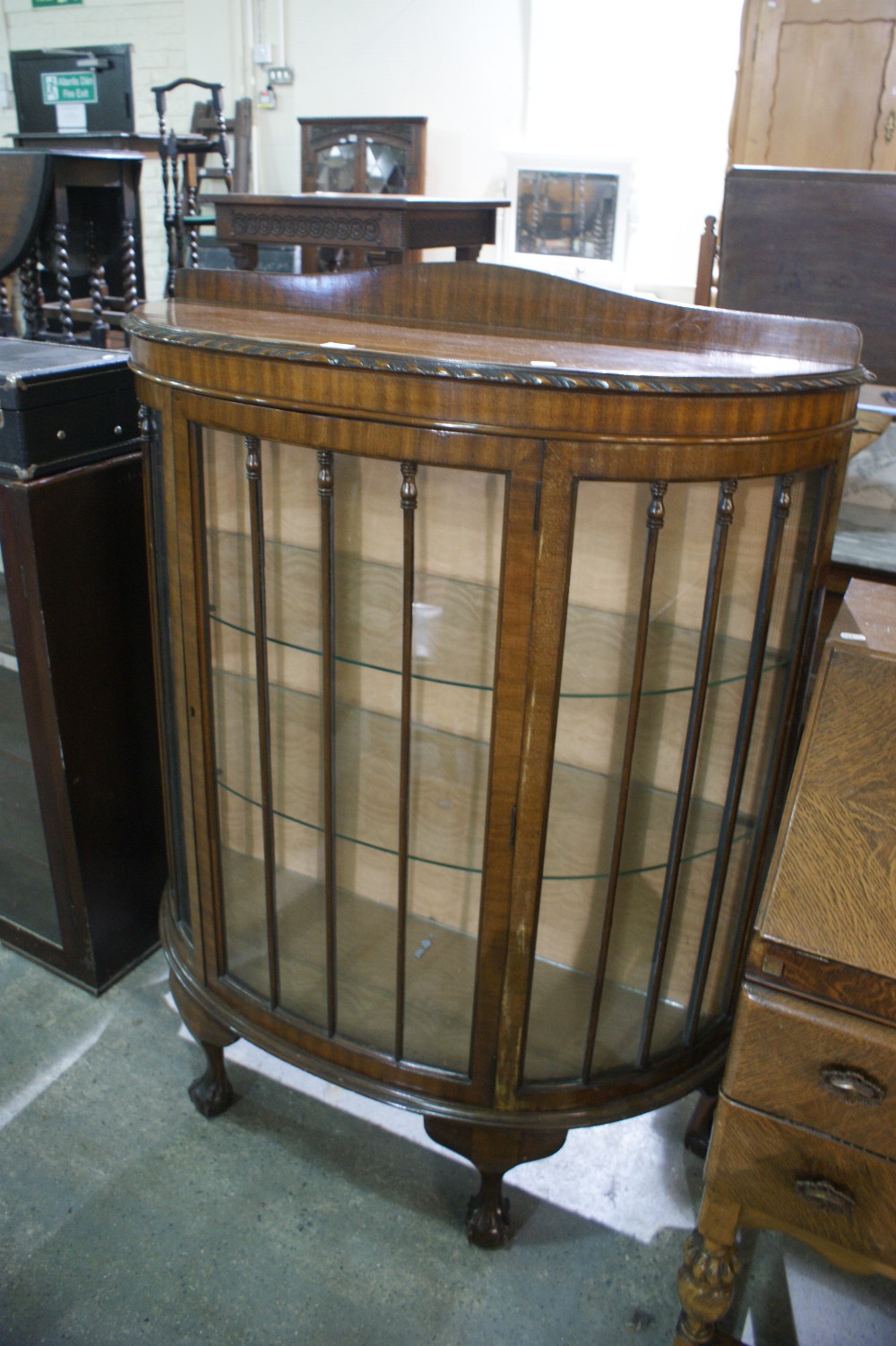 An Early 20th Century Mahogany Bow Front China Cabinet