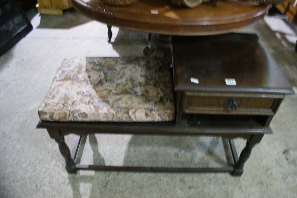 A 20th Century Polished Oak Telephone Seat