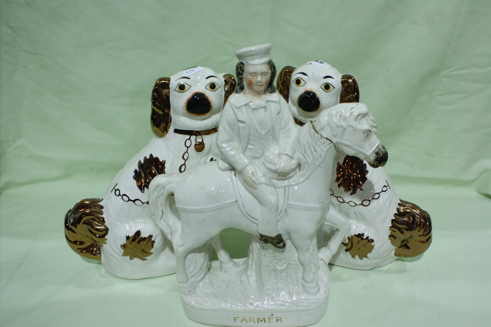 A Pair Of Staffordshire Pottery Copper Lustre Decorated Dogs Together With A Staffordshire Pottery