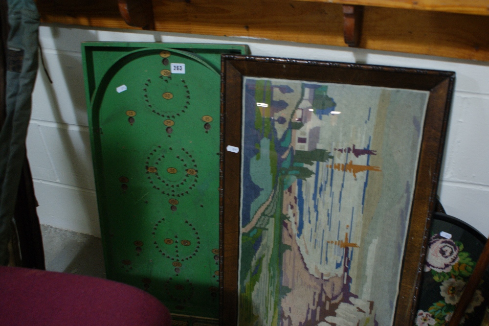 A Vintage Bagatelle Board Together With A Wool Work Picture And Others