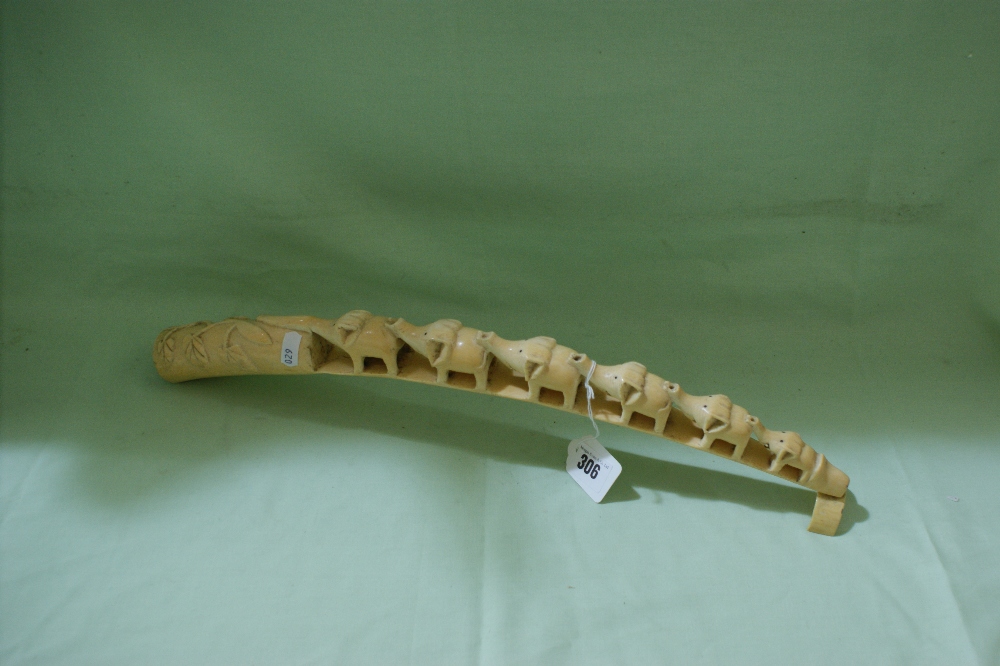 An Antique Ivory Tusk Carved As A Train Of Elephants 20" Long