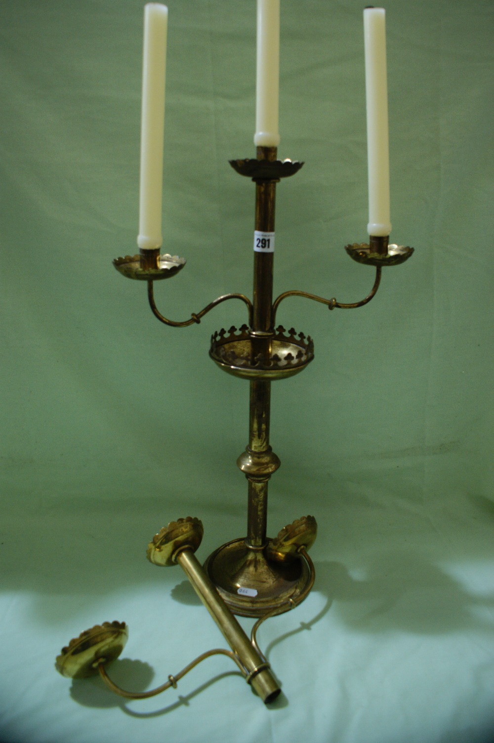 A Circular Based Three Sconce Brass Candelabrum