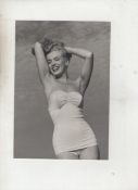 Marilyn Monroe original bw photograph showing Marilyn in a swimsuit three quarter length smiling