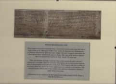 Medieval document fragment of text c1300 on a strip of parchment^ approx 22x8cm framed with a text