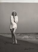 Marilyn Monroe original bw photograph showing Marilyn in a hooded top on Tobey beach. By George