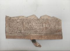 Medieval document  probably 15th c^ written in Latin on a single strip of vellum with remains of