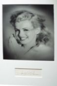 Collection of original photographs and books relating to Marilyn Monroe ? autograph signature of