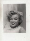 Marilyn Monroe original bw photograph showing Marilyn hs winking towards the camera. By Andre De