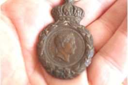 Napoleonic Wars ? St Helena Medal good example^ lacking ribbon and certificate. The medal^ struck