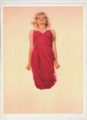Marilyn Monroe original colour photograph showing Marilyn jumping for joy (in mid-air)^ in a red