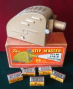 The Stip Master Film Strip Projector: Metal construction 35mm comes with 5 films Treasure Island,