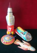 Nomura (TN Toys of Japan) Tinplate Solar S-X7: Battery operated Rocket is silver, red, plastic swing