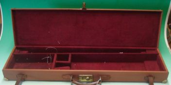 Brown Leather Gun Case: Tan Brown having Brass corners and lock and securing straps with Maroon