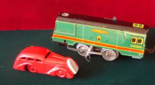 Tinplate Clockwork Mettoy Car: Red Sudan car with original Key (repainted) together with 0 gauge