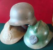 Selection of Military Helmets: To include German style helmet complete with liner and chin strap