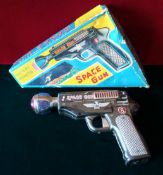 TN Toys (Japan) Space Gun: Tinplate battery operated Space Gun with Light Ball End in original