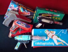 Four Chinese Space Guns: To include Raketapisztoly, Laser Shooter, Space Gun, Sparkling Pistol all