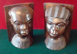 Pair of African Carved Bookends: Male and Female busts with panel to rear caved each been carved