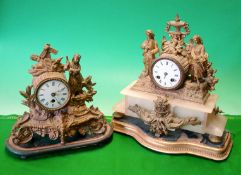 Two French Classical figure Clocks: Both having cast cases that have been gilded one mounted on