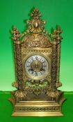 Victorian Brass Gothic Style Eight Day Mantel Clock: Having a Silvered dial ring with roman numerals