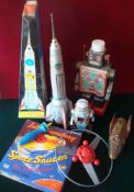 Selection of Space Related Toys: To include Merit Space Saucer (boxed), Elzett Muvek Tinplate Rocket