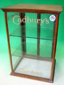 20th Century Cadbury’s Glass Display Cabinet: Having 2 glass shelves with 2 sliding doors and